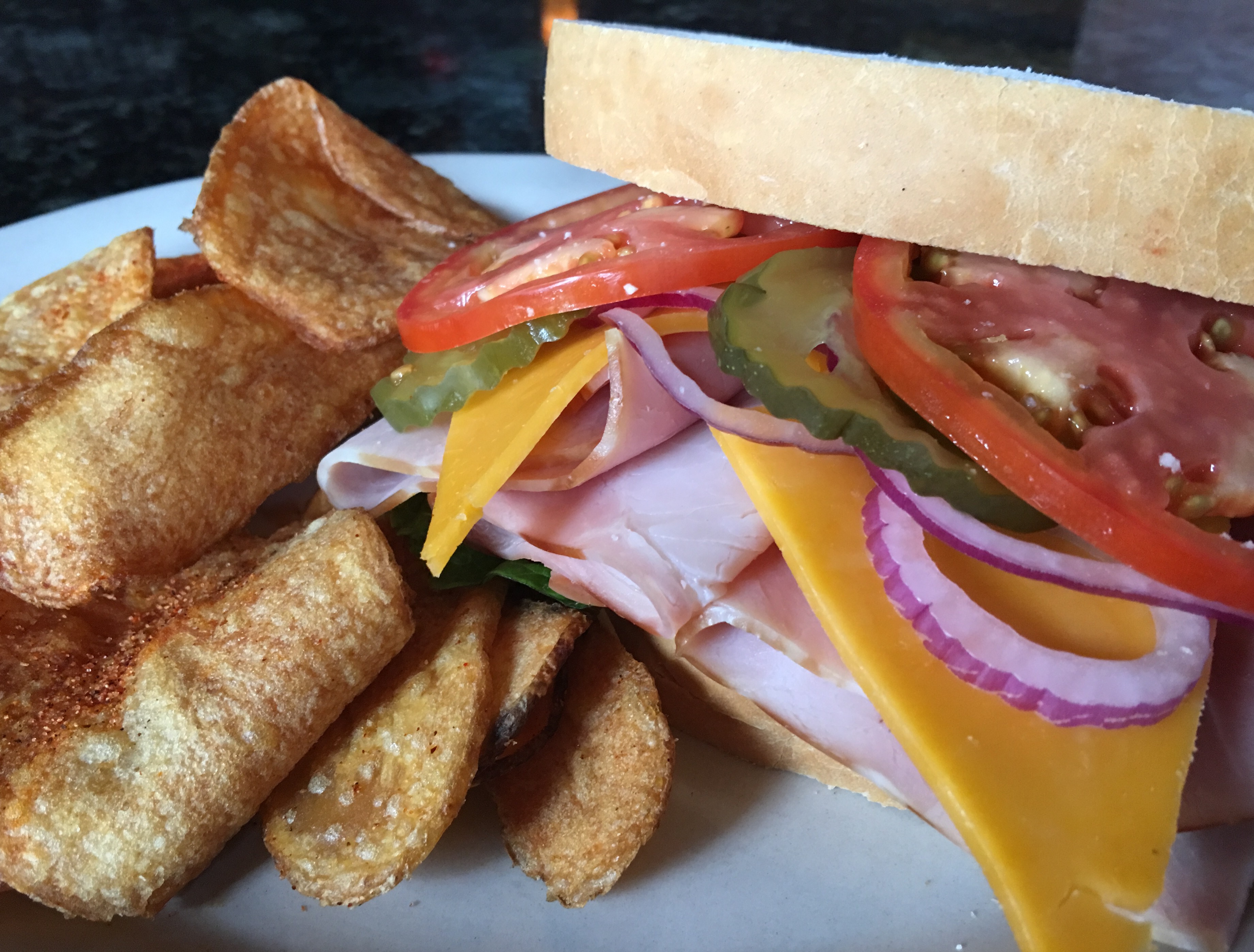 Lunch Special: Deli Style Ham or Turkey on sourdough with choice of cheese, & side, $7.95